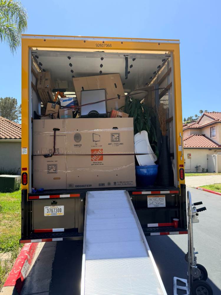 Boxes tiered and squared off tight so nothing shifts in transit