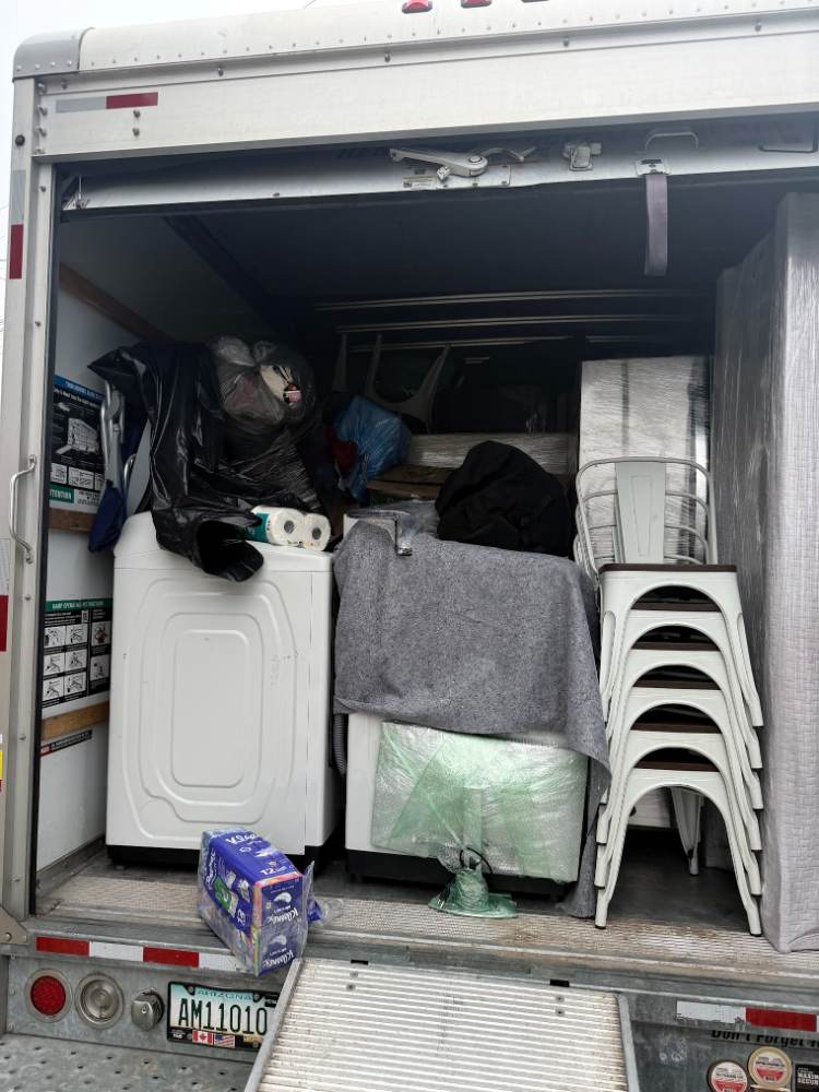 AAA Pro Movers loading a moving truck on a job near Chula Vista, California