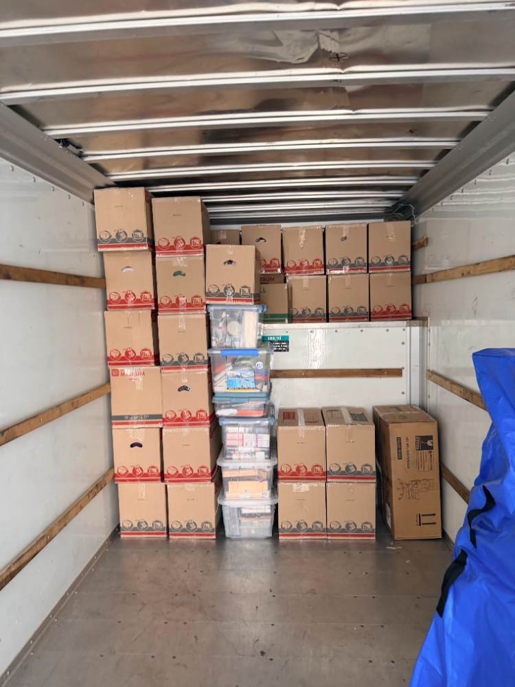 San Diego movers with a fully loaded moving truck on a house move